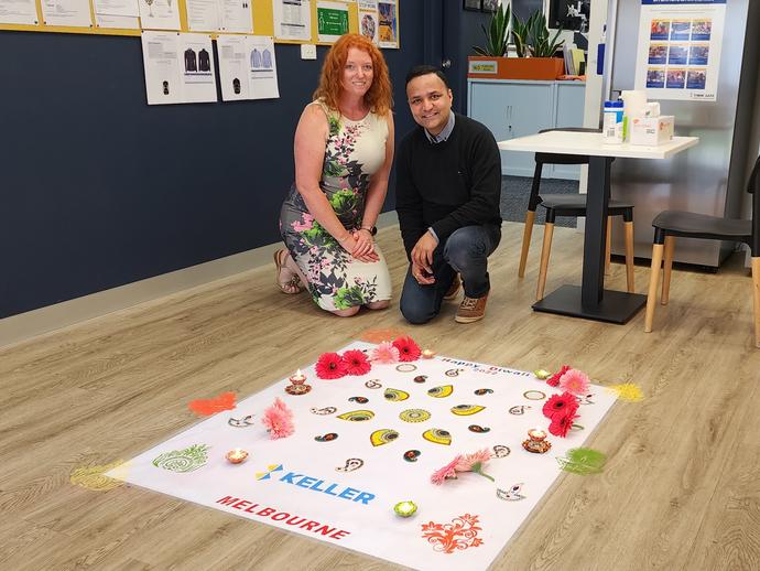 Lea and Daivesh make Keller rangoli